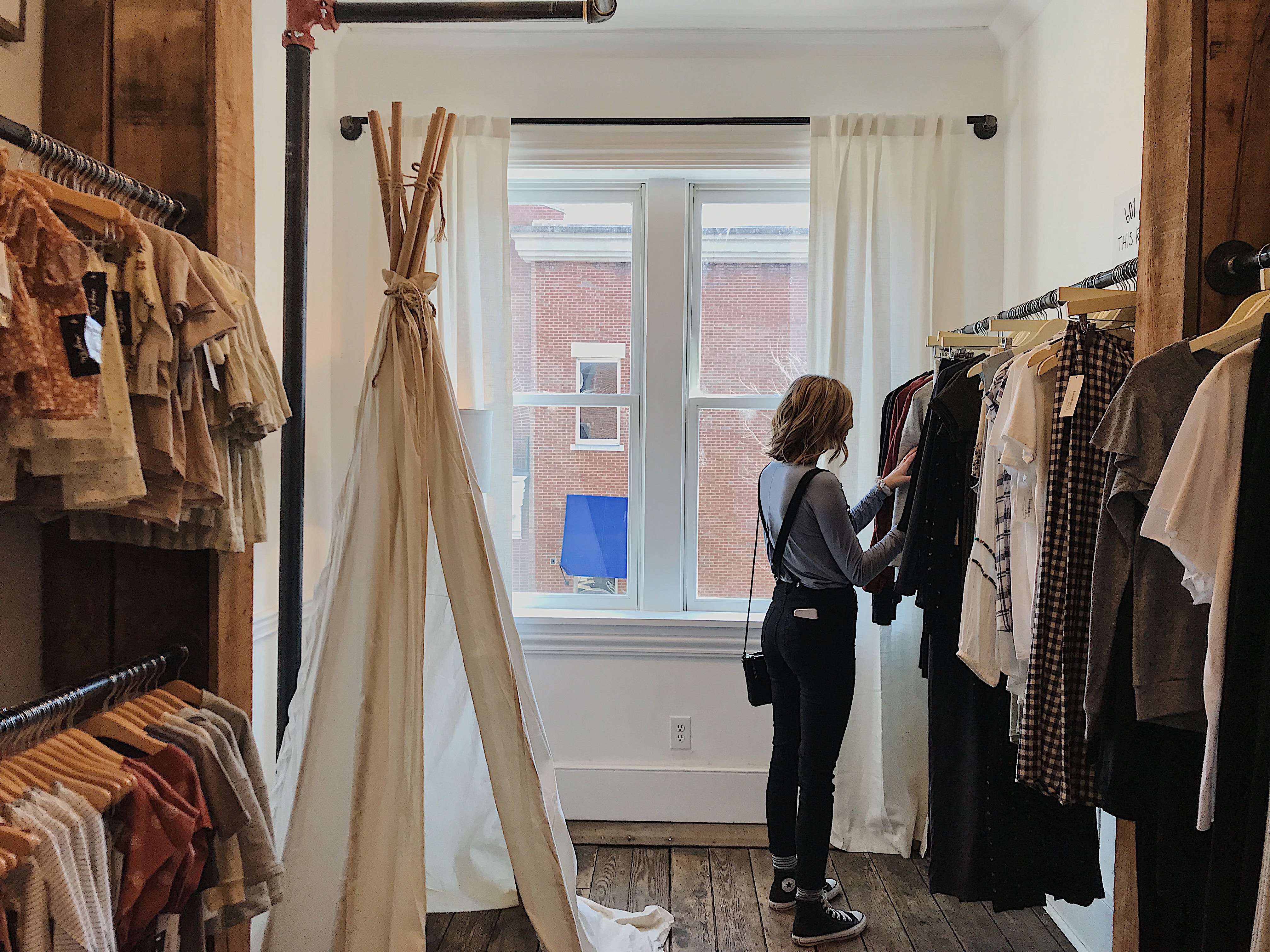 A woman in a clothing store